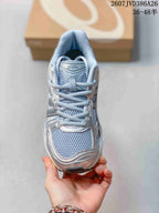 Top view showing the mesh toe box, laces, tongue, and padded collar.