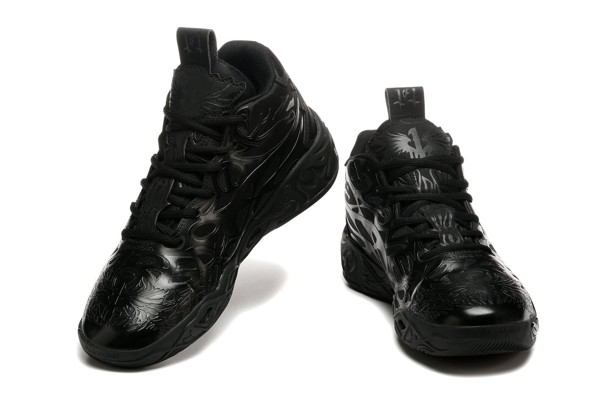 Pair of black PUMA LaMelo Ball MB.02 basketball shoes shown from front and three-quarter angles.