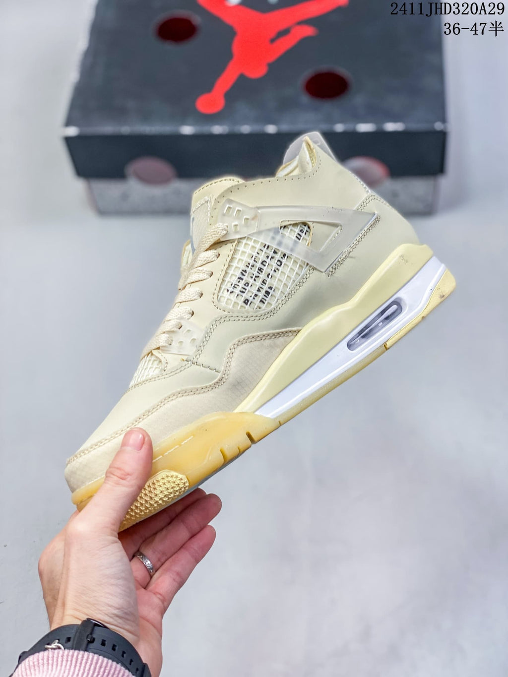 Side profile showing the mesh panel, molded wing, visible air unit, and contrasting outsole