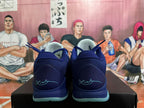 Rear view showing the padded heels and Kobe signature details on navy basketball shoes