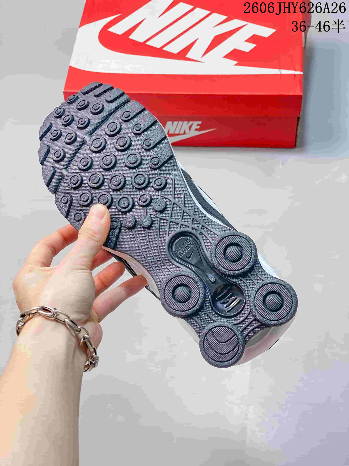 Underside of the Nike Shox Ride 2 sneaker showing its patterned outsole and heel pods