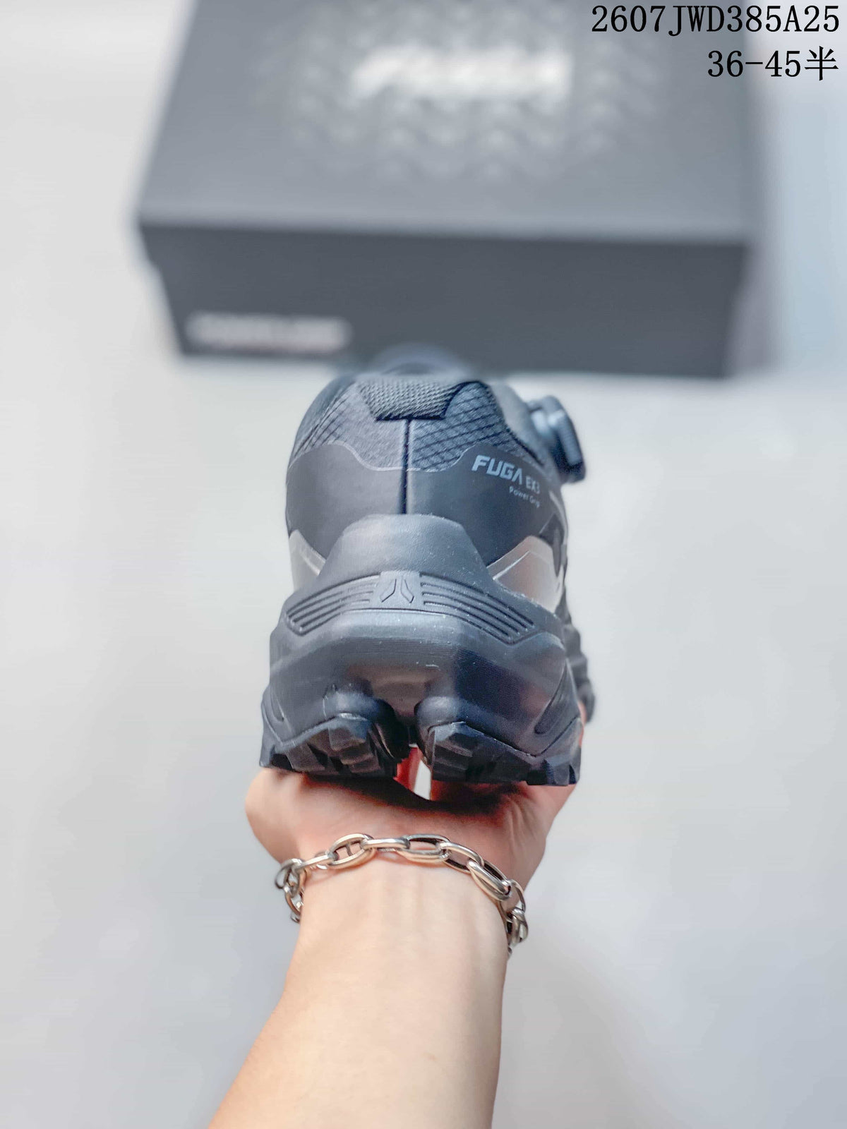 Rear view of the dark gray shoe showing the FUGA EX3 marking, padded heel and rugged outsole.