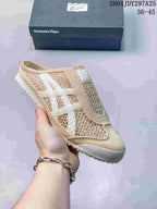 Beige Onitsuka Tiger Mexico 66 Sabot sneaker with white side stripes, shown with its box; the image shows style code 2604JDY297A25 and size range 36–45.