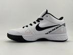 Side profile of the GIGI basketball shoe in white and black