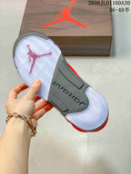 Underside of the sneaker showing a translucent outsole and dark midfoot section.