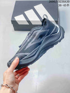 Side profile of a dark gray low-top trail running shoe
