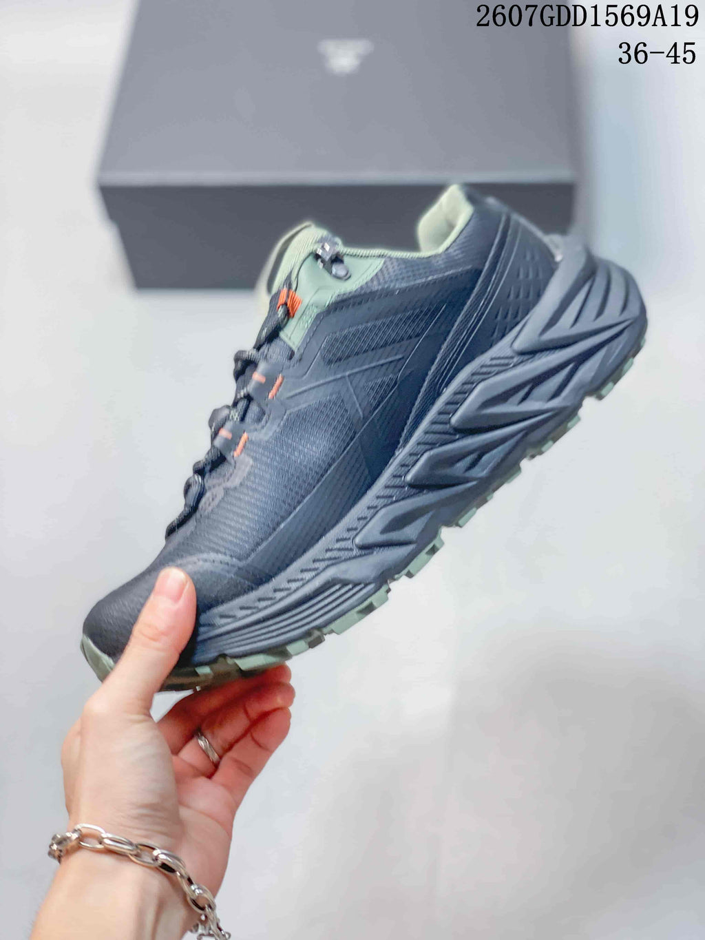 Side profile highlighting the low-cut shape, mesh-style panels, lace system, and sculpted midsole.