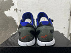 Rear view of gray camouflage basketball shoes with blue collars and dark heel details
