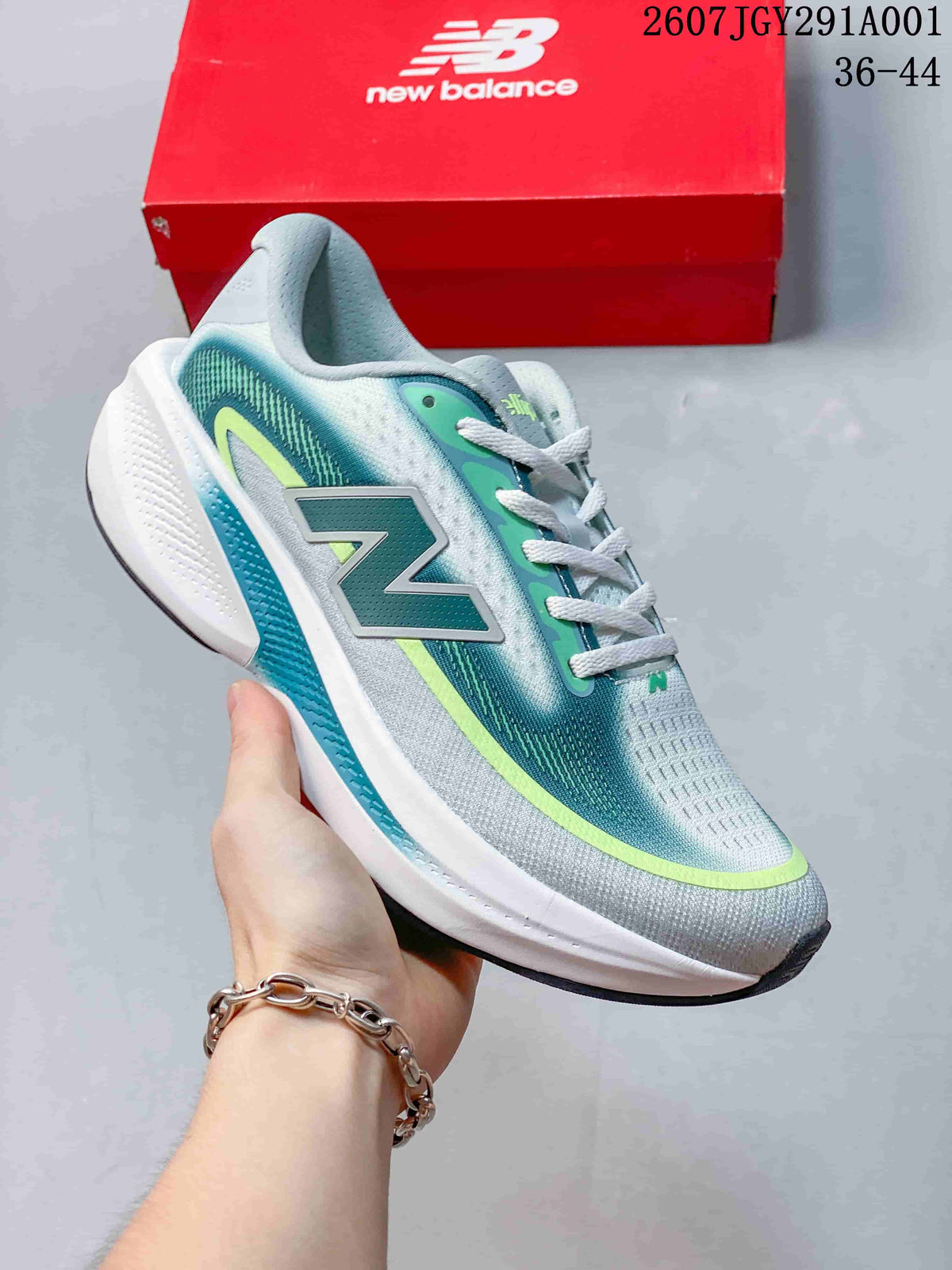 Gray New Balance running shoe with teal and lime accents, pictured beside a red shoe box.