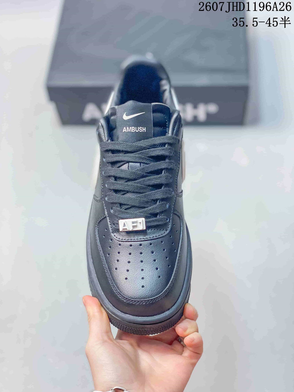 Top view showing the perforated toe box, black laces, and tongue branding.