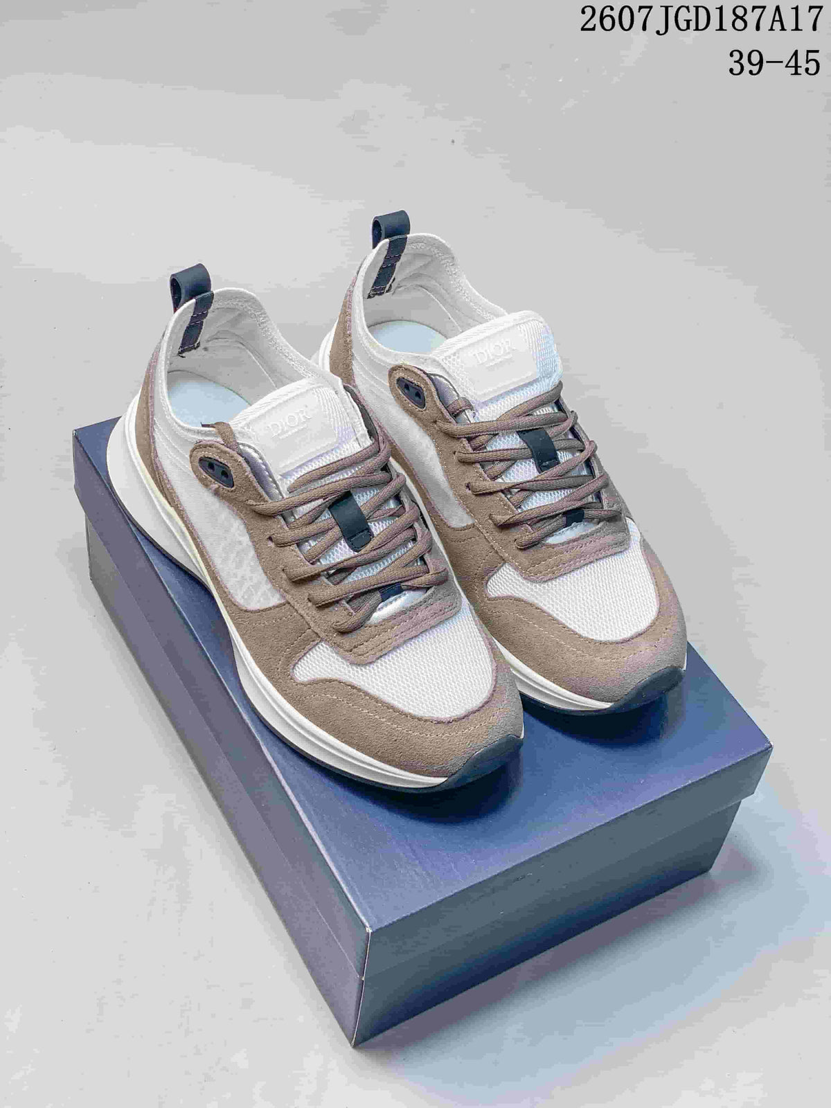 Pair of Dior B25 Runner sneakers in white and taupe displayed on a Dior shoe box; the image shows the style code 2607TGD187A17 and size range 39–45.