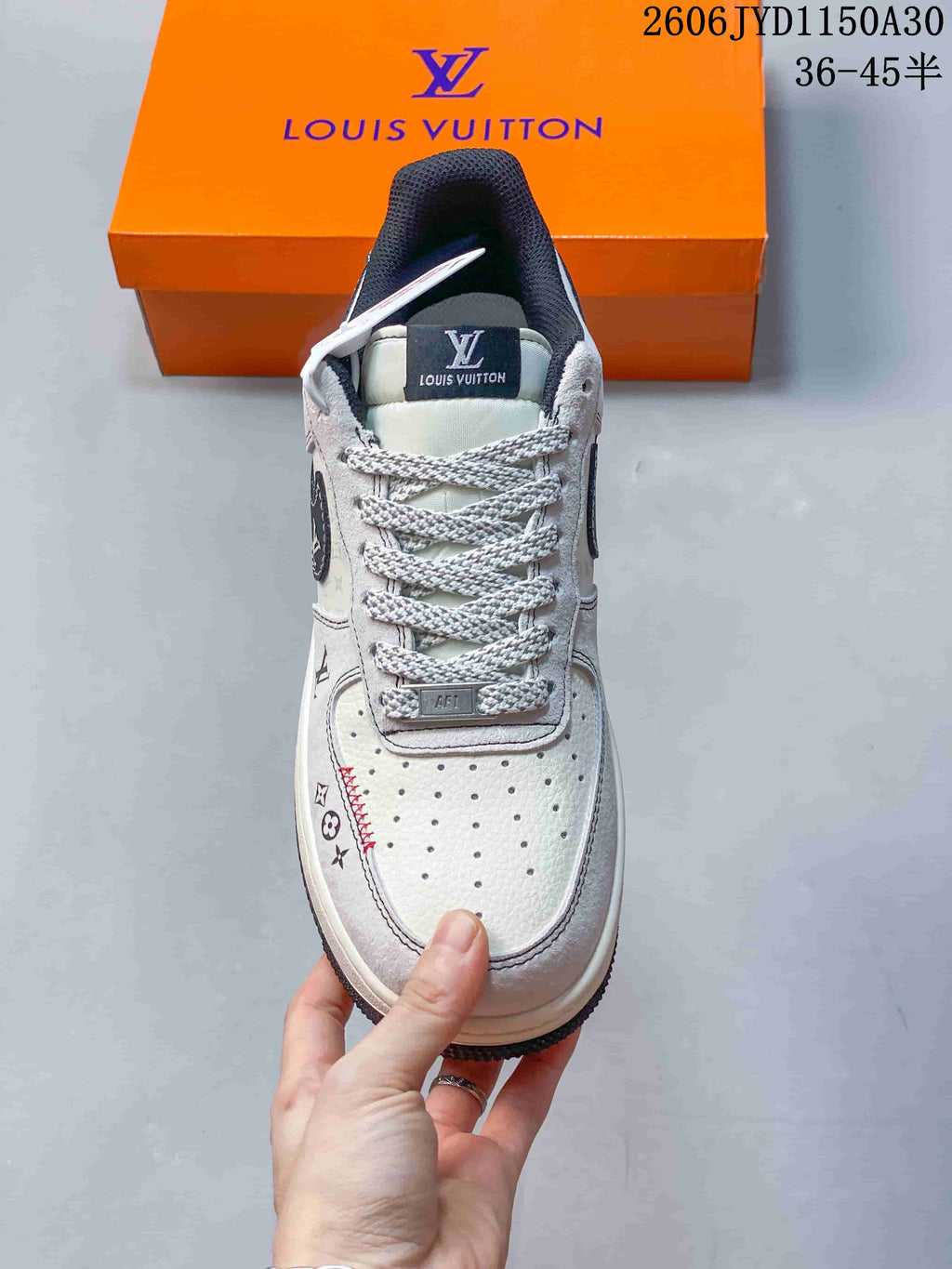 Front view showing the perforated toe, patterned laces, and graphic details