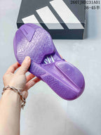 Close-up of the purple shoe outsole and textured tread