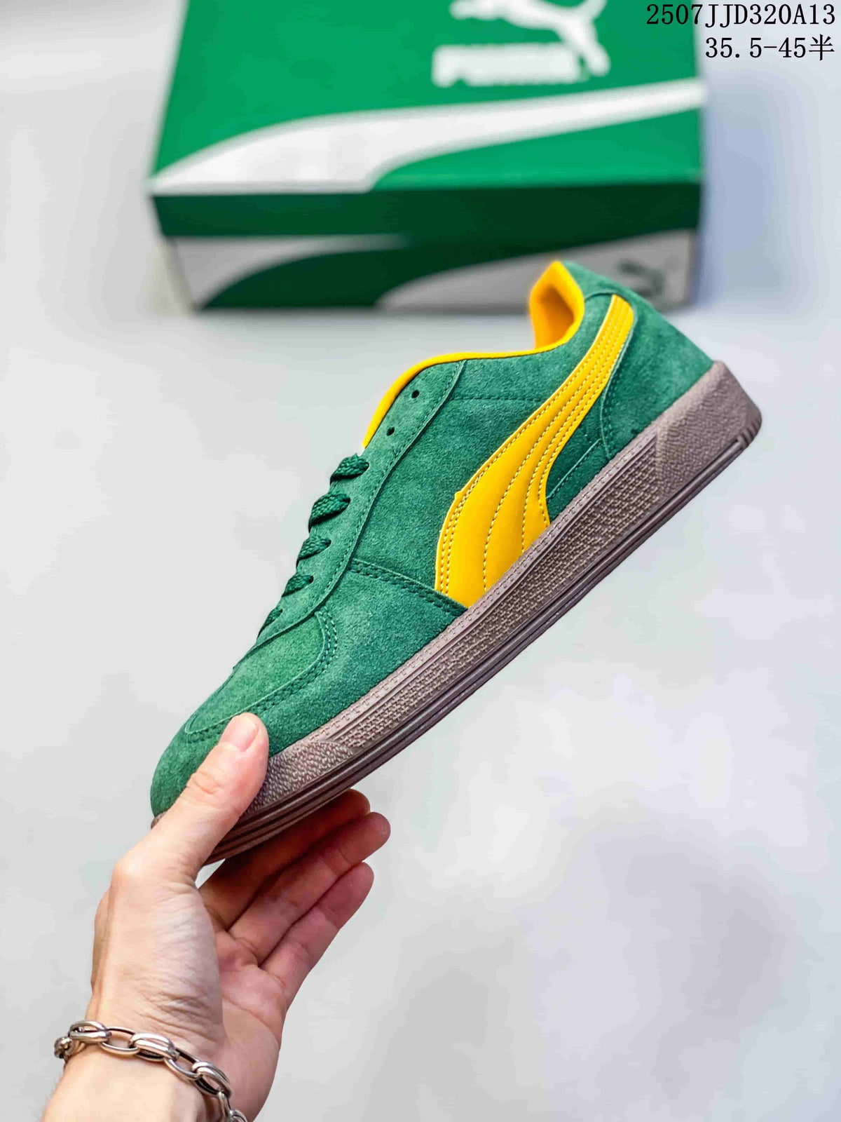 Side profile showing the yellow PUMA Formstrip and brown rubber outsole.