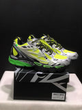 Pair of neon green, black, white, and silver Off-White sneakers displayed on a branded shoe box; the box label shows size 41.