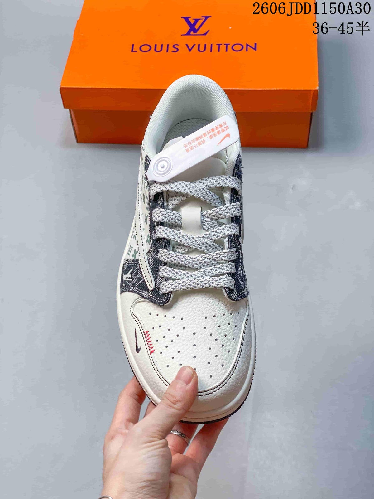 Top view of the sneaker showing its perforated toe and gray laces