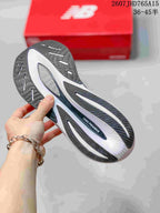 Outsole view showing the black and white segmented traction pattern and FuelCell branding.