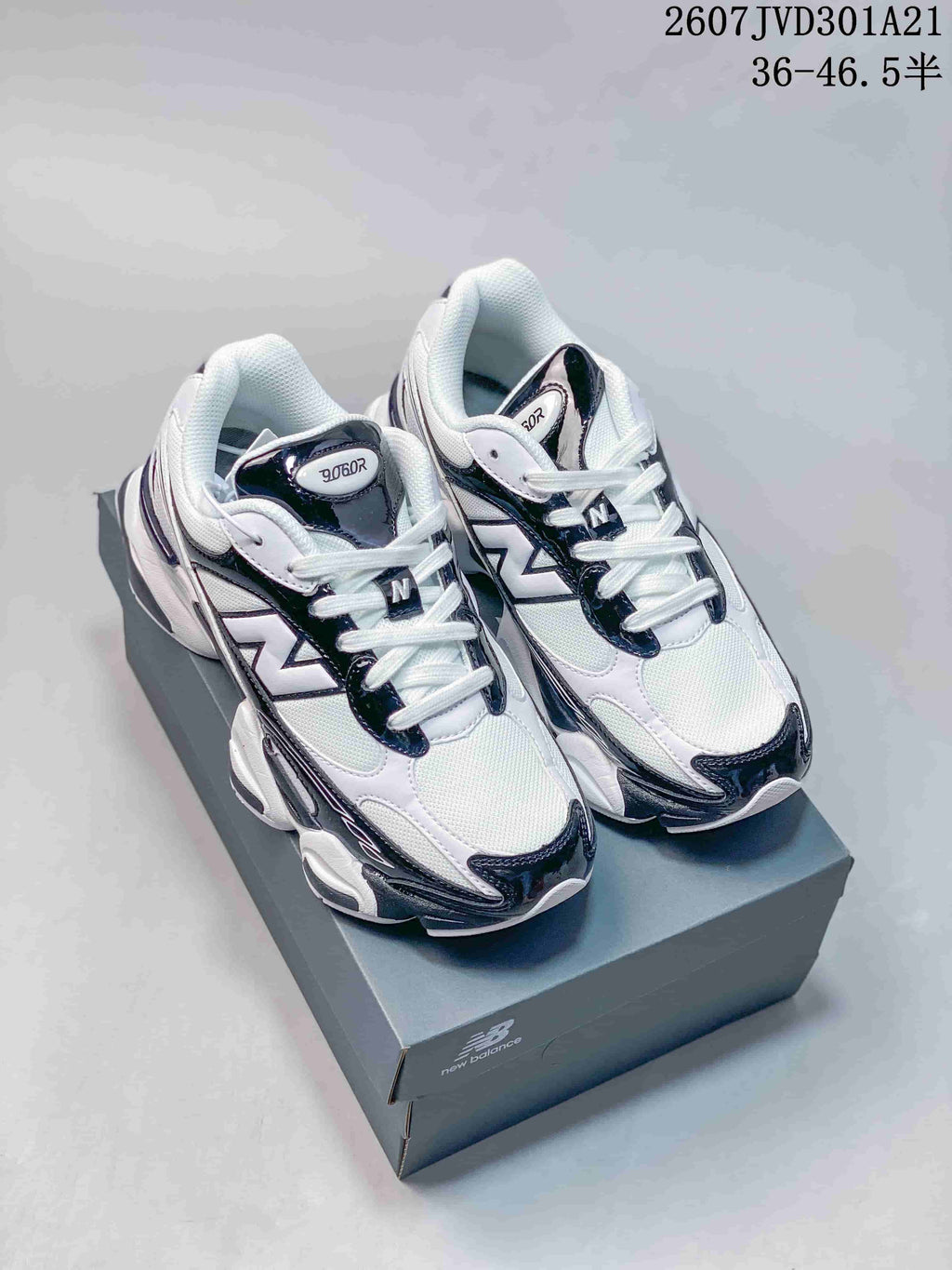 Pair of white, navy, and black New Balance 9060R sneakers displayed on a New Balance shoe box; overlay shows model code and the range 36–46.5 with half sizes.