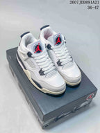 Pair of white Nike Air Jordan 4 Retro sneakers displayed on a shoebox, with black and red details visible.