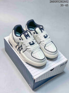 Pair of white MLB Chunky Liner sneakers with navy accents