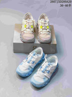 Two colorways of the On Cloudswift Amp sneakers shown together, including neon yellow and light blue accents.