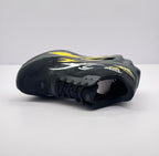Angled top view highlighting the black upper, laces, tongue branding and side graphics.