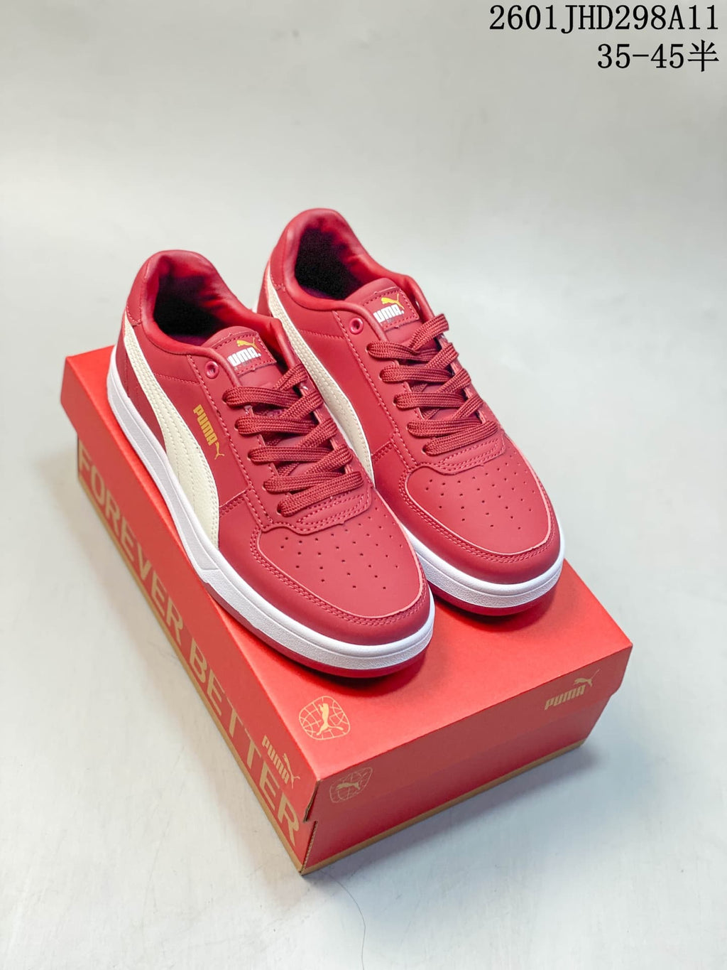 Red Puma Caven 2.0 low-top sneakers displayed on a red shoebox, with the source size range visible above.