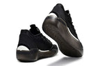 Black Jordan 39 shoes shown from the heel and sole.