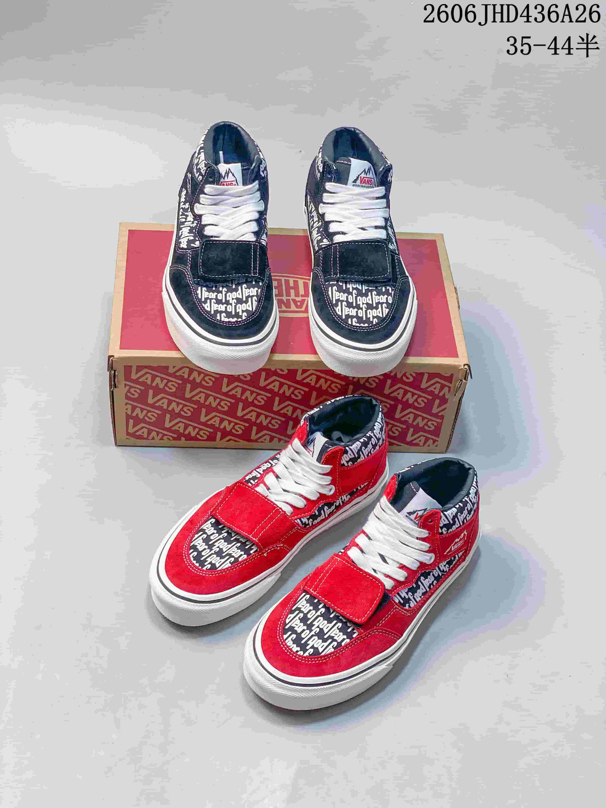 Red and black colorways of the Fear of God x Vans Era 95 Reissue sneakers.