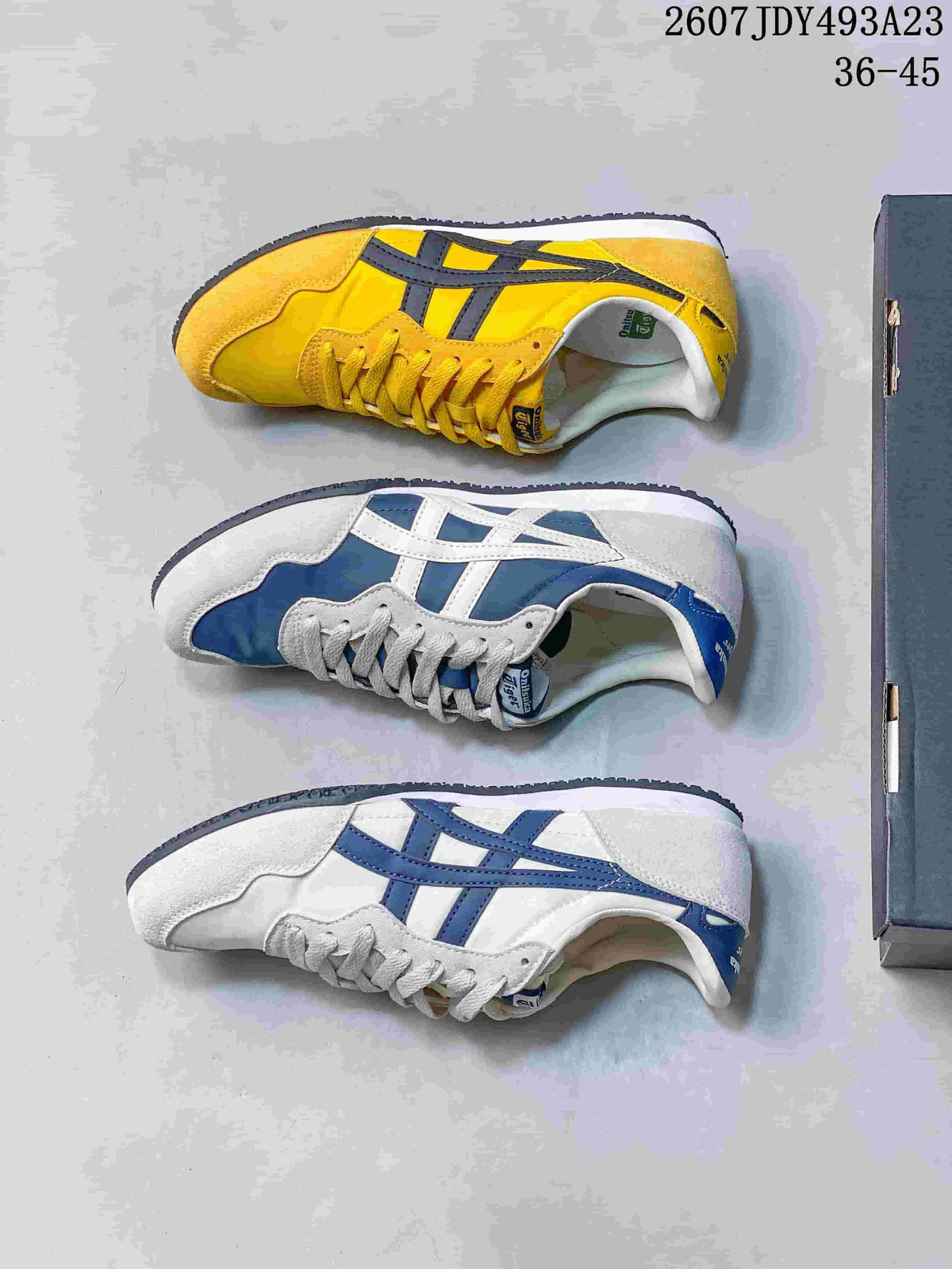 Three Onitsuka Tiger Serrano sneakers shown from above in yellow, blue and white-blue colorways.