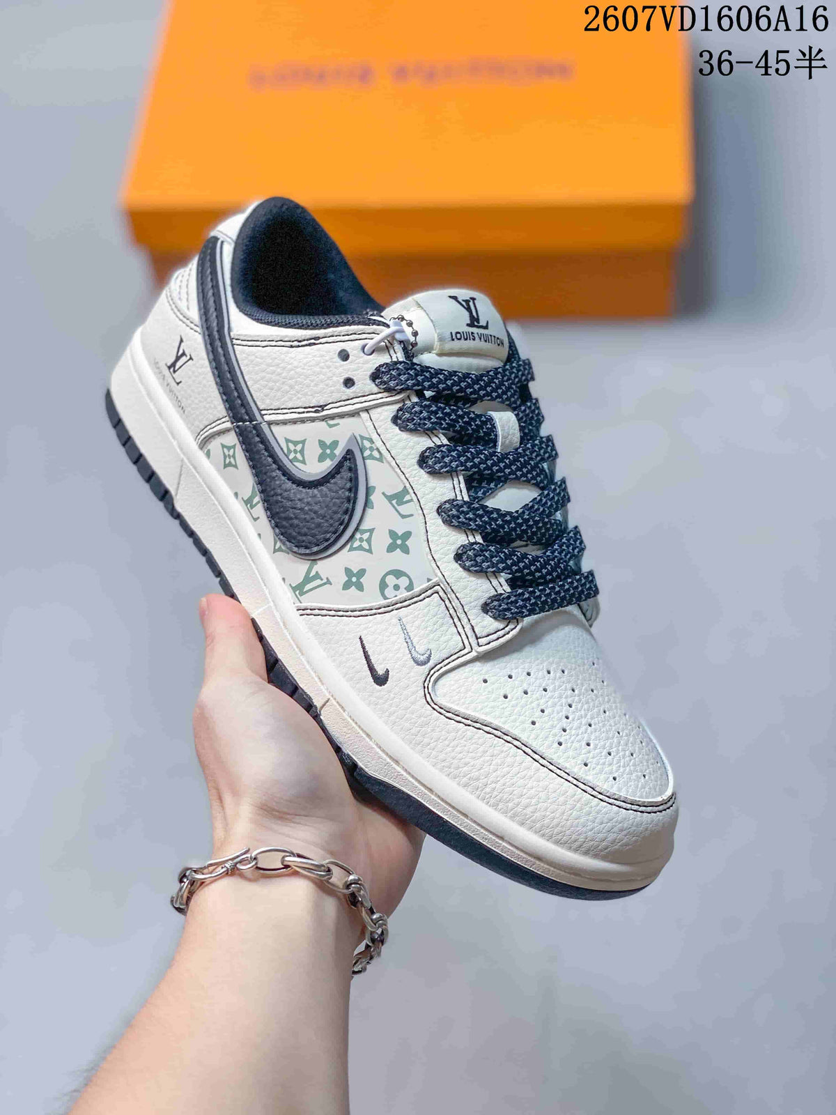 Side view of a white sneaker with a patterned side panel, dark navy swoosh-style detail, rope laces, and a padded dark collar.