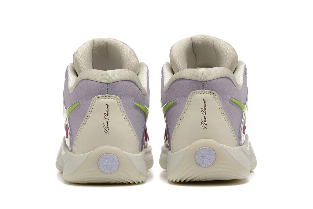 Rear view of the Nike KD basketball shoes showing the heel panels and cream-colored soles
