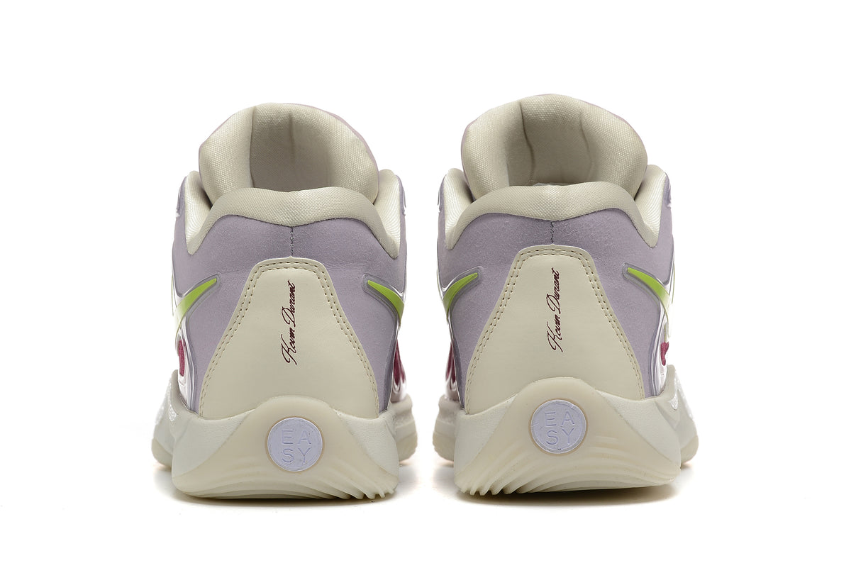Rear view of the Nike KD basketball shoes showing the heel panels and cream-colored soles