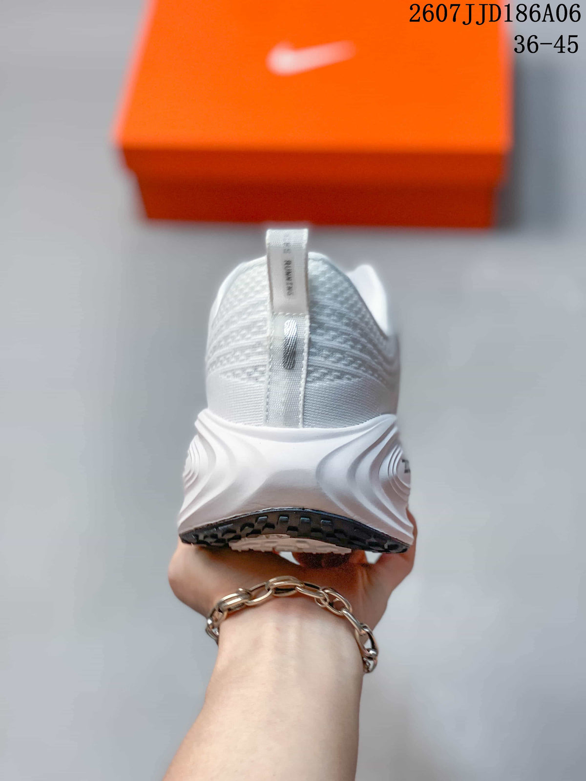 Rear view of the white running shoe showing the padded heel collar, pull tab and layered heel structure.
