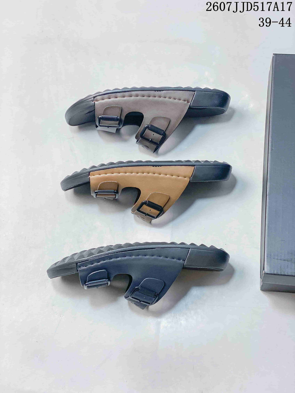 Side profile comparison of taupe-gray, tan, and black ECCO slide sandals showing their textured outsoles.
