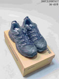 Pair of black Salomon XA PRO 3D shoes displayed on a Salomon box, with product code 2607JLD387A17 and a printed size range visible.