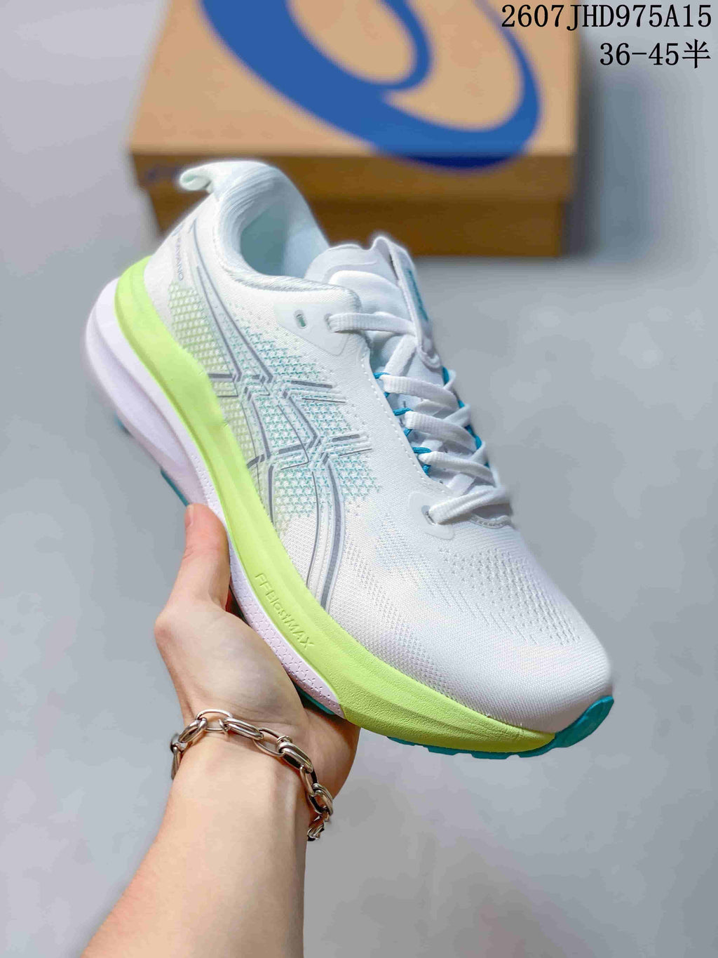 Side view of a white ASICS running sneaker with lime-green midsole and blue outsole accents.