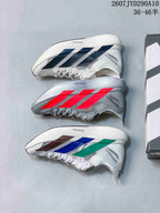Three Adidas Adizero Adios Pro Evo 2 colorways shown together: white with dark accents, silver-gray with bright red accents, and white with blue, green and dark accents.
