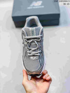 Top view showing the mesh toe box, lace-up front, and tongue branding.