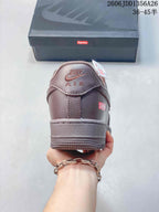 Rear view of the brown sneaker showing the heel branding and tonal sole