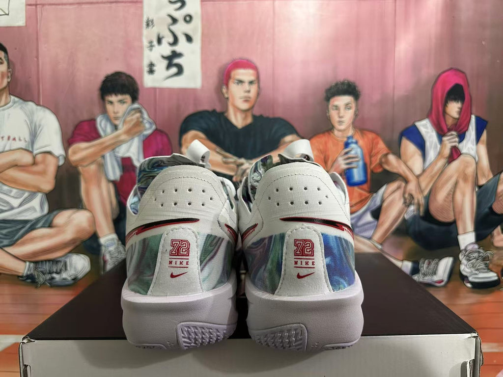 Rear view of white Nike basketball sneakers showing multicolor heel panels, red accents and heel branding.