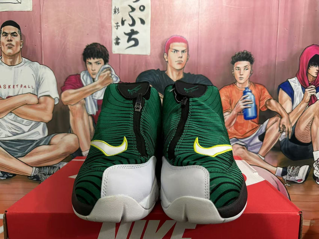 Front view showing the zippered upper, yellow-edged Nike Swoosh accents and white forefoot sections.