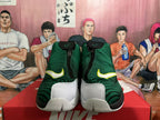 Front view showing the zippered upper, yellow-edged Nike Swoosh accents and white forefoot sections.