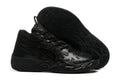 All-black high-top basketball shoes with graphic side detailing and sculpted soles.