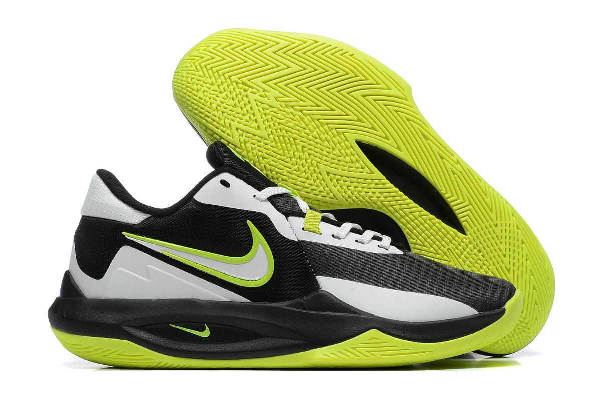 Black and white basketball shoe with neon green accents and a bright green outsole.