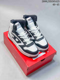 Pair of white and dark gray Diesel S-Ukiyo high-top sneakers on a red shoebox