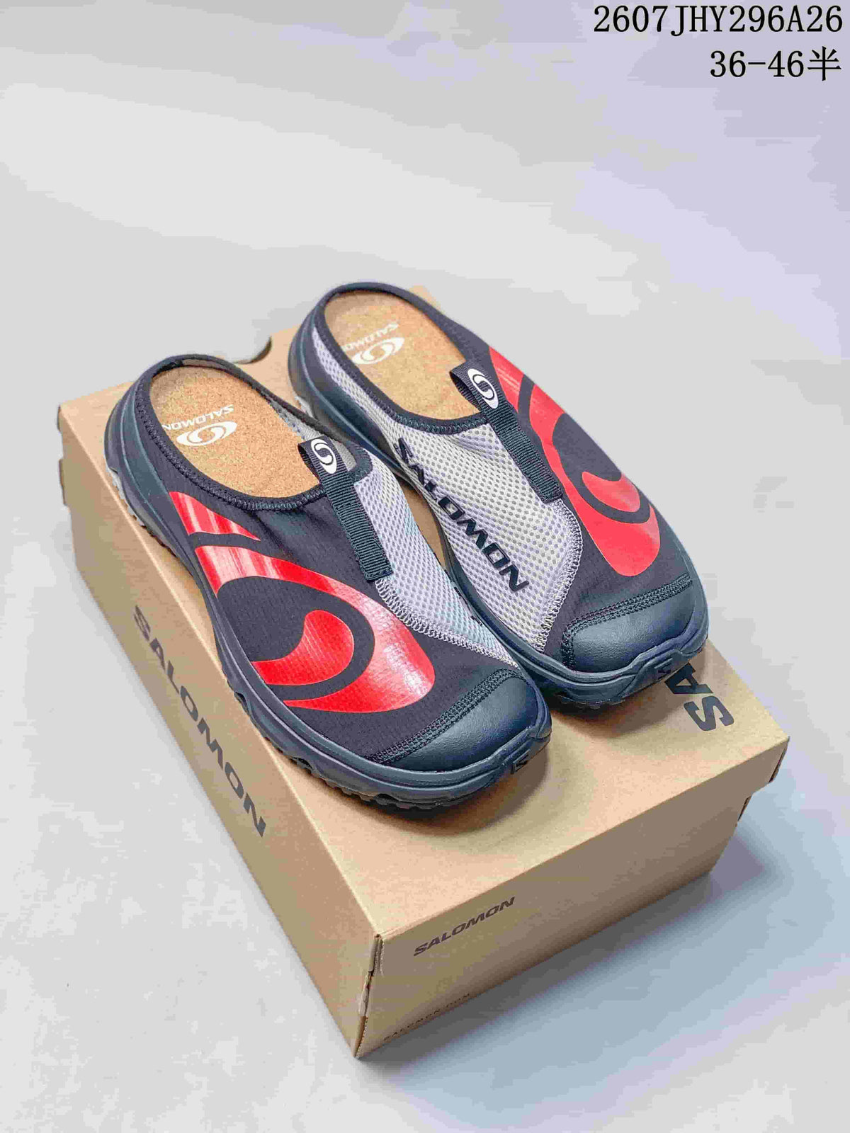Pair of black Salomon RX Slide 3.0 closed-toe mules with gray mesh panels and red detailing on a Salomon shoe box.