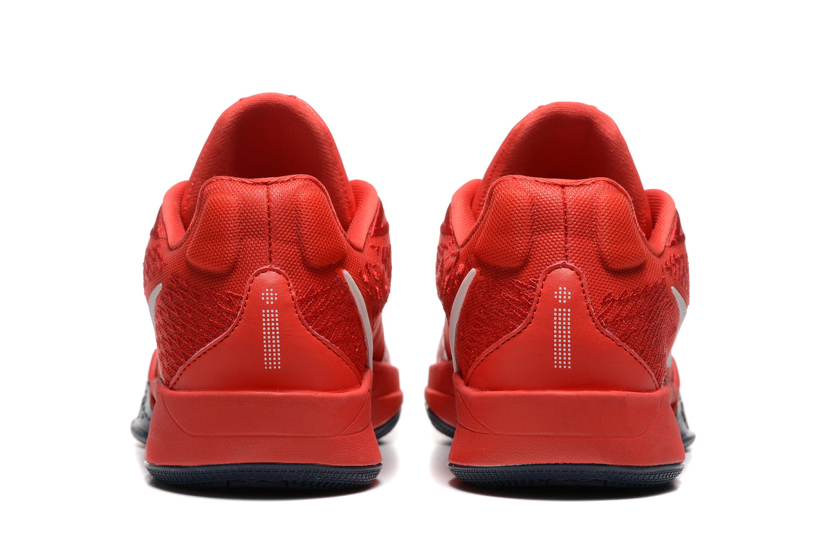 Rear view of the red Nike Sabrina basketball shoes.