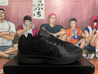 Side profile of a black low-cut basketball shoe with Swoosh branding