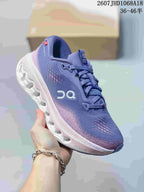 Purple and pink On Cloudsurfer 3 sneaker with a white sculpted outsole.